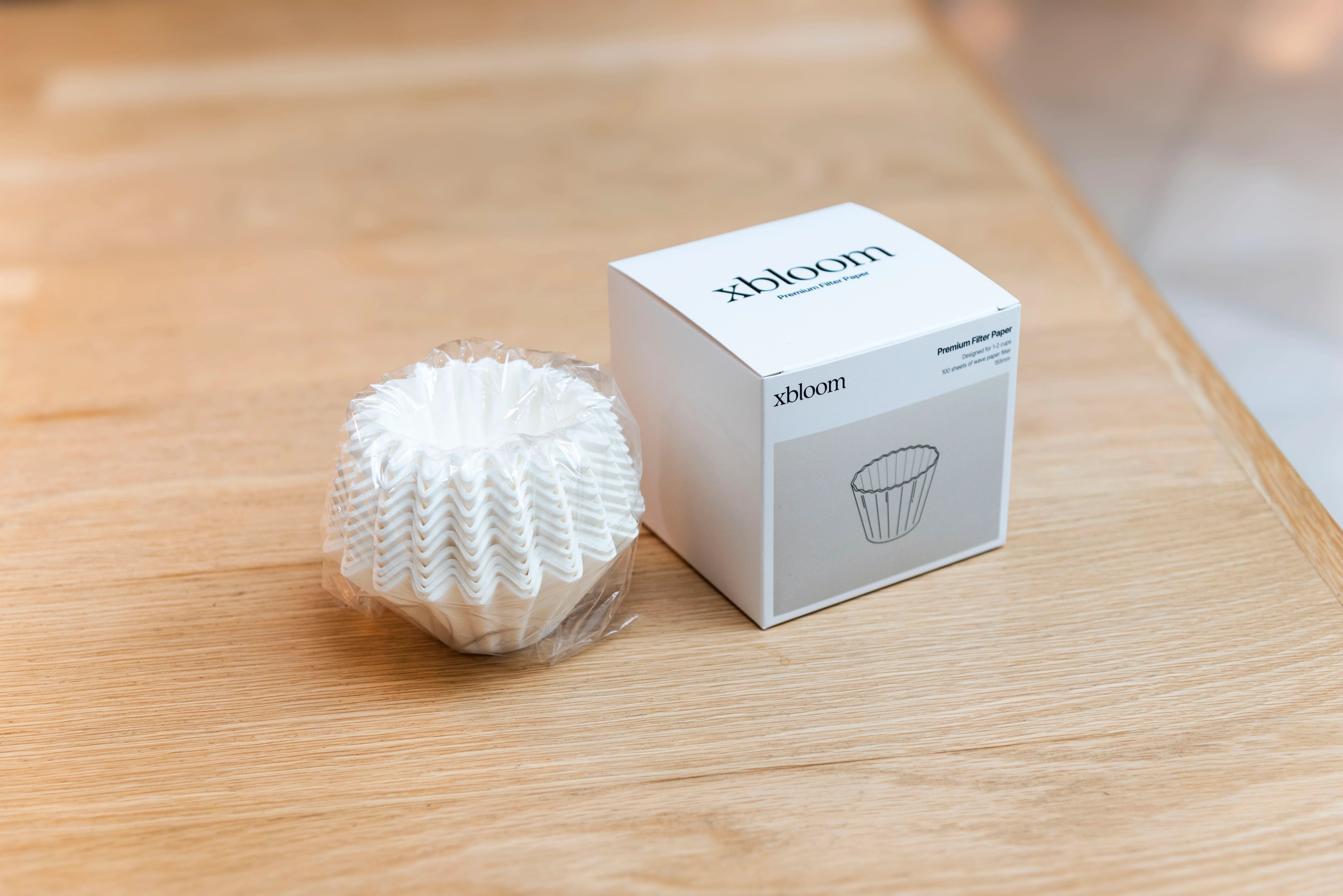 xBloom premium paper filters in use on the Omni Dripper